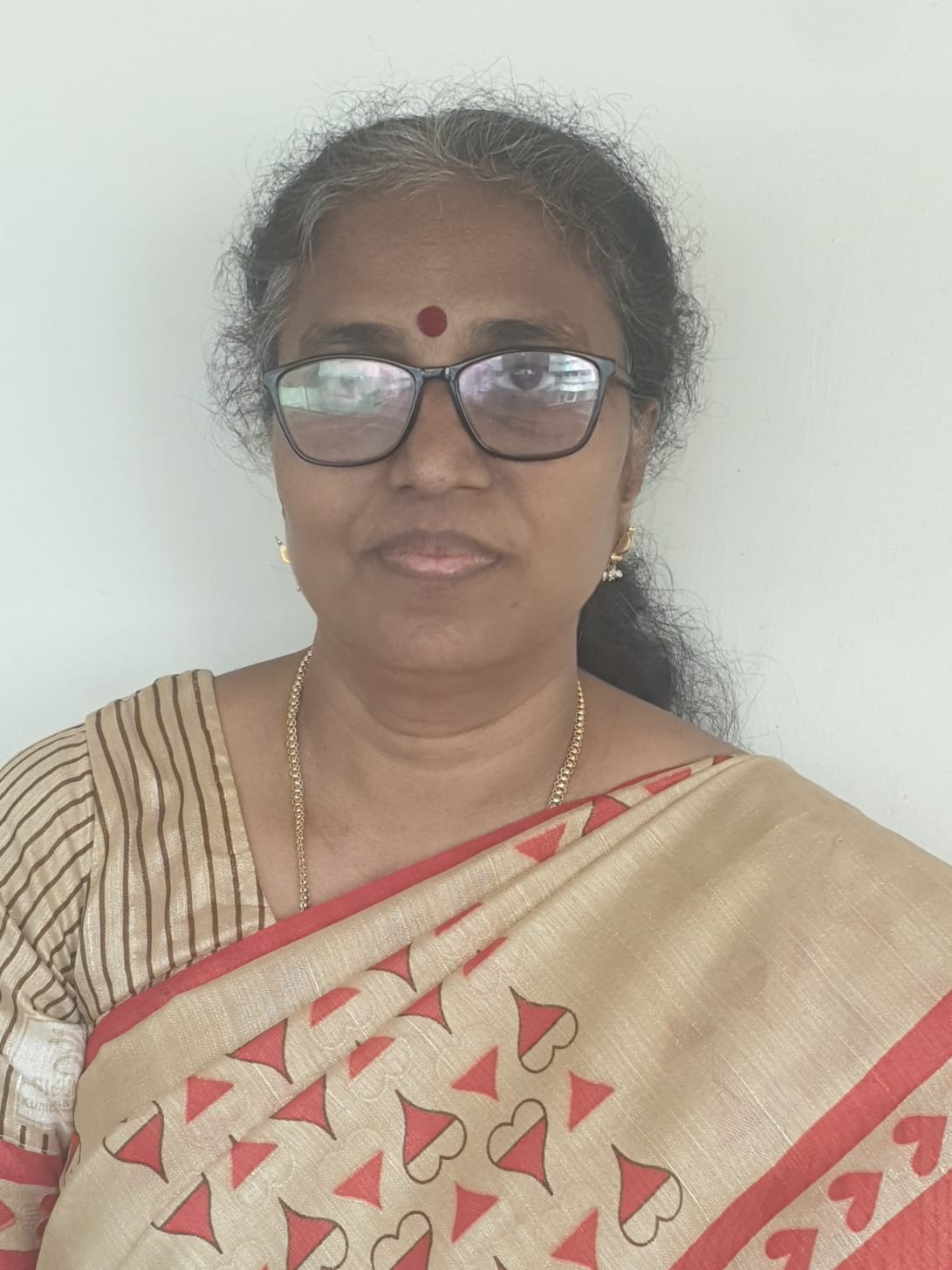 SUDHA T